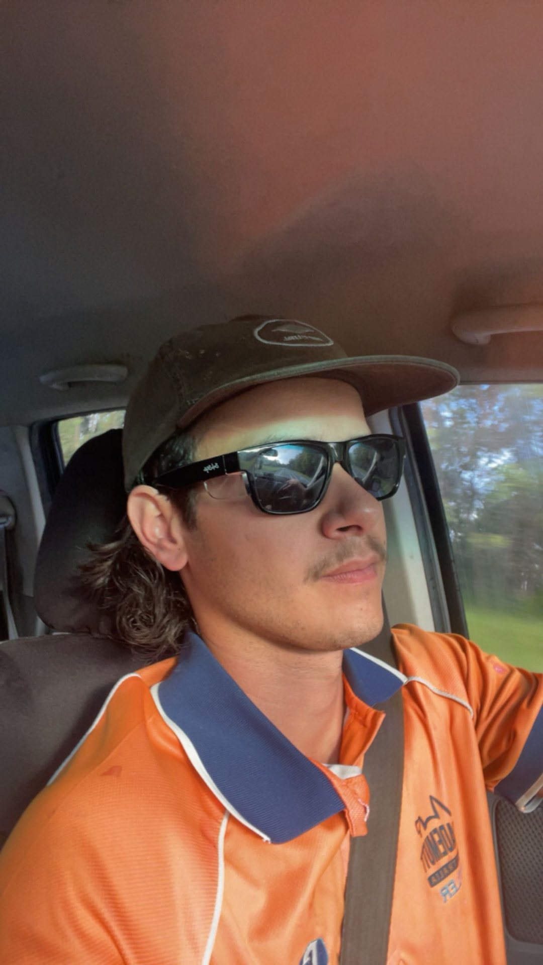 Tyler in high-vis work uniform during his plumbing apprenticeship